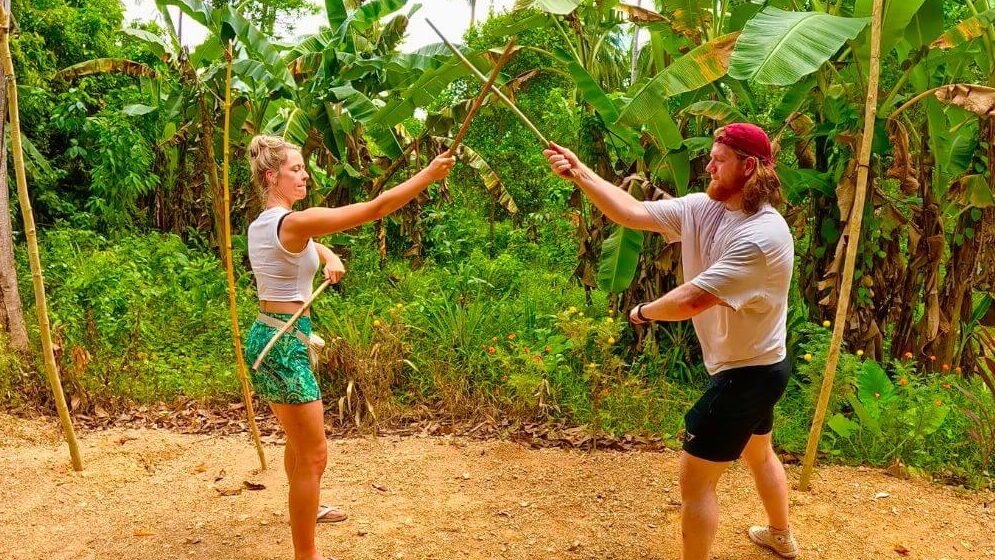 Arnis stick fighting demonstration, El Nido Visitors practicing Arnis stick fighting during The Philippine Experience cultural tour in El Nido